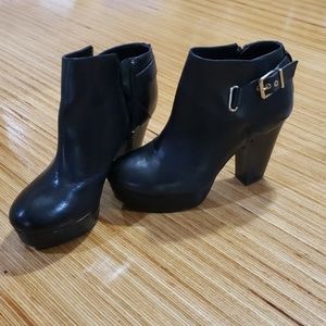 Black Gianni Bini booties.